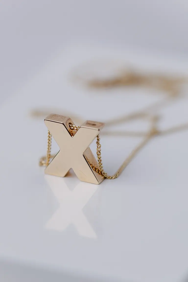 Necklace with letter “X” — photo 1
